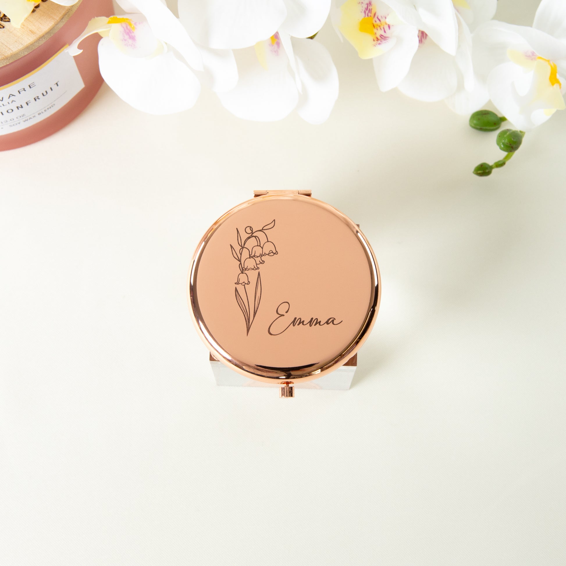 Rose gold personalised compact mirror with Emma engraved on it