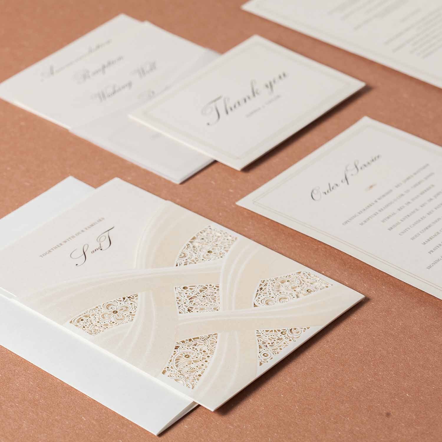 personalised laser cut wedding invitation and matching cards